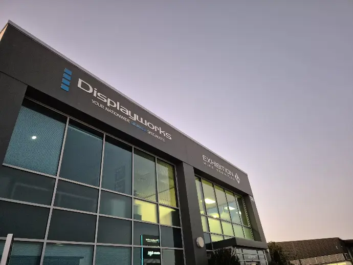 Exterior building branding with bulkhead logos for Displayworks Flagship in Christchurch
