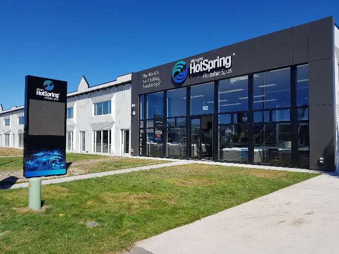 Full corporate branding for Hot Spring Spas including building signage, Outdoor LED screens, roadside pylons and vehicle branding.