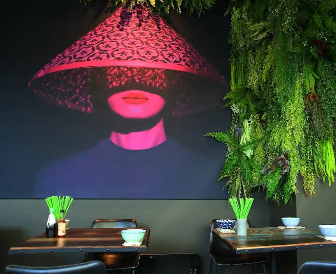 Feature wall graphics add a fun atmosphere to a custom restaurant fit out.